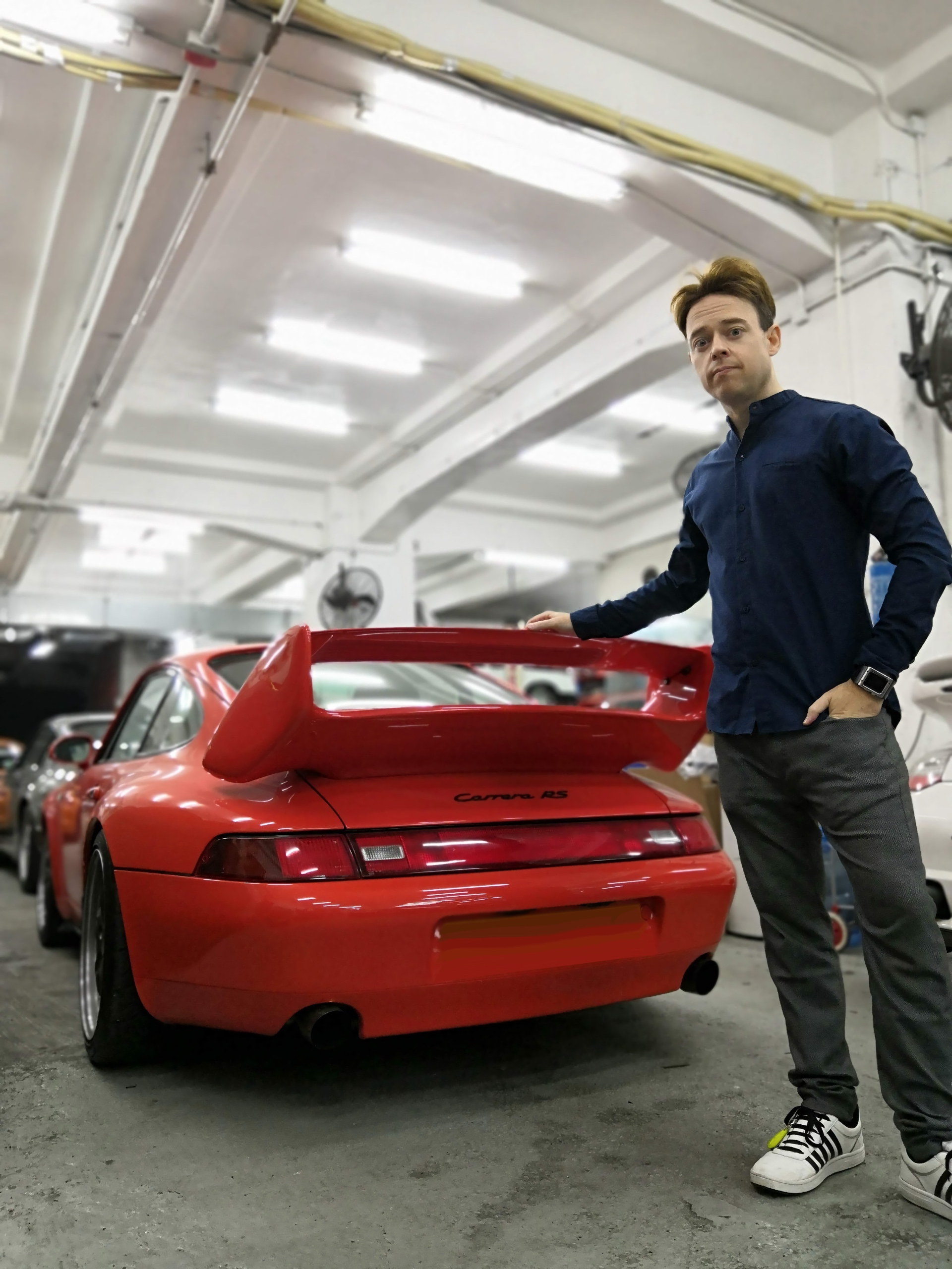 Gregor Hans Schöner standing beside The Schöner Porsche 993 prototype